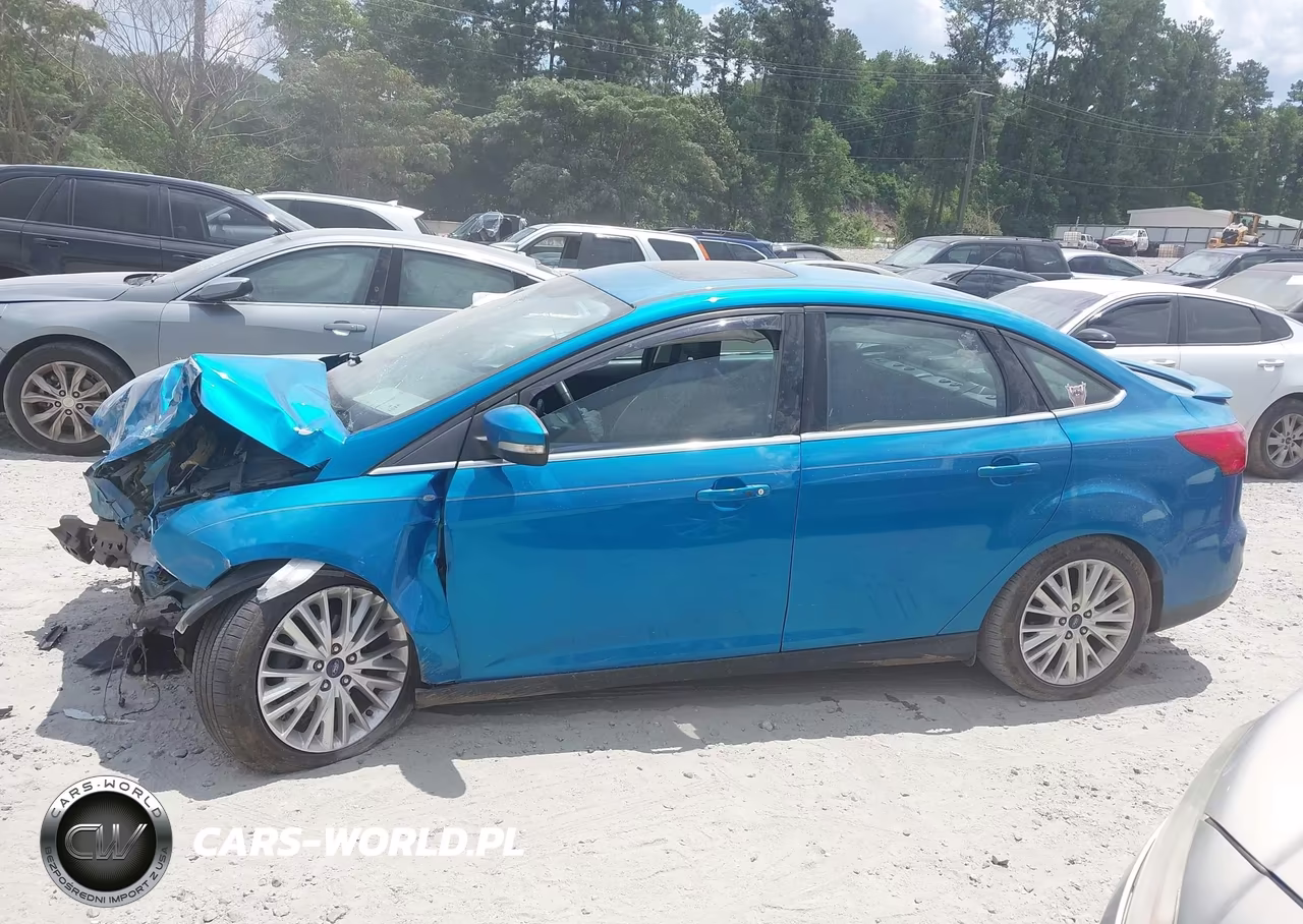 2016 Ford Focus Titanium VIN:1FADP3J24GL242612 - 13