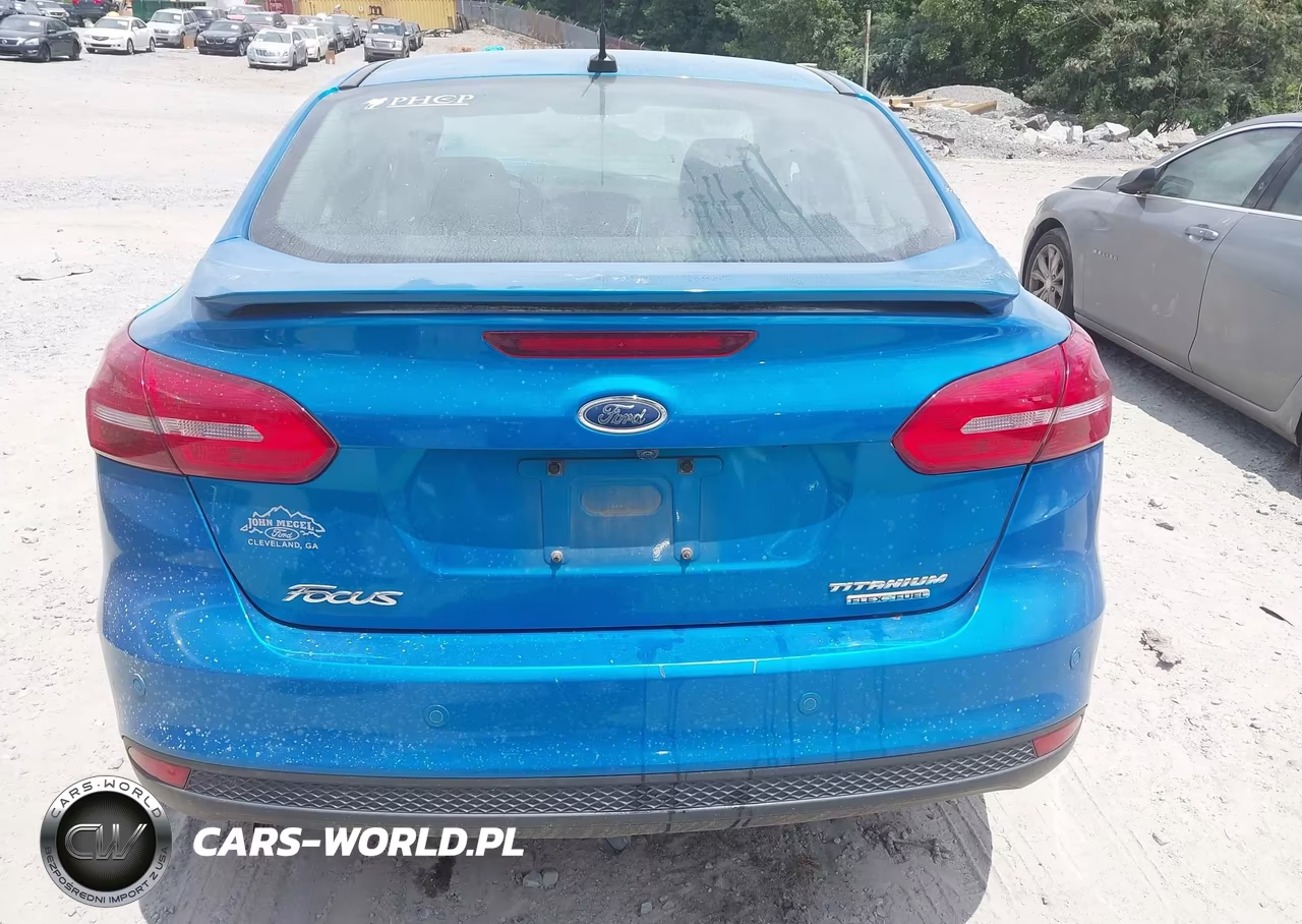 2016 Ford Focus Titanium VIN:1FADP3J24GL242612 - 15