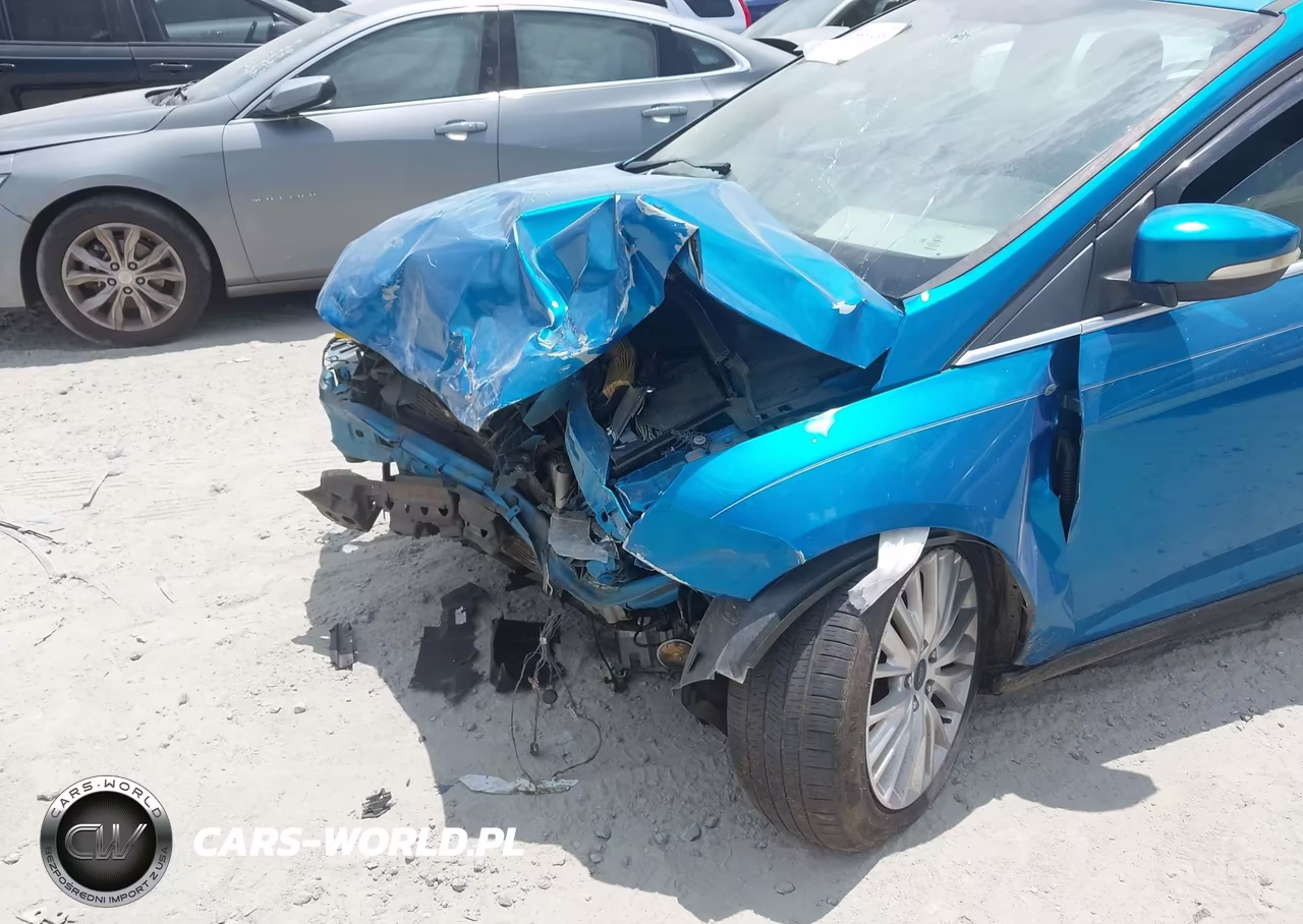 2016 Ford Focus Titanium VIN:1FADP3J24GL242612 - 6
