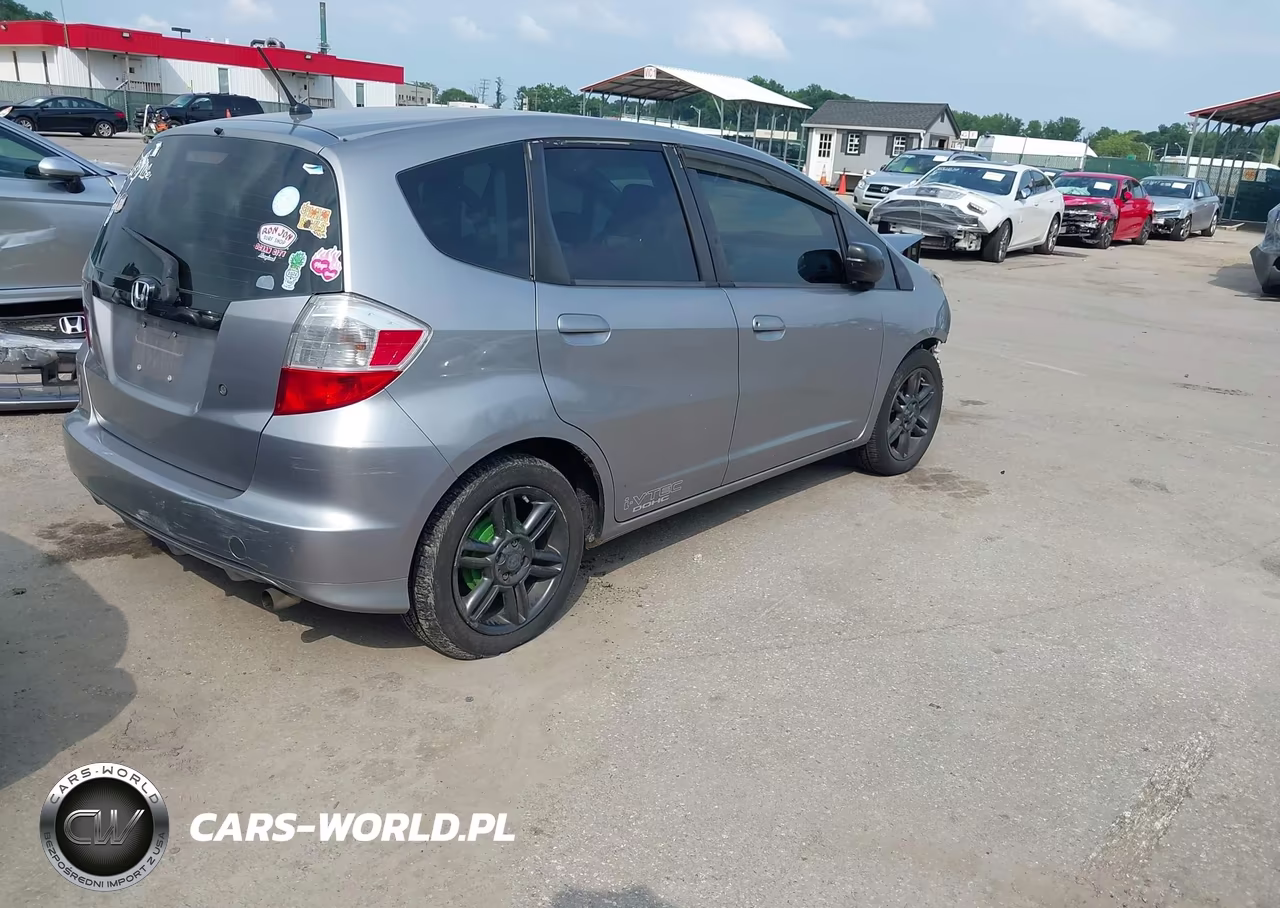 2009 Honda Fit VIN:JHMGE88289S057583 - 4