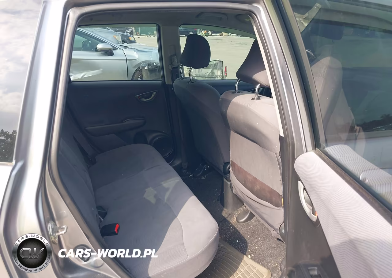 2009 Honda Fit VIN:JHMGE88289S057583 - 8