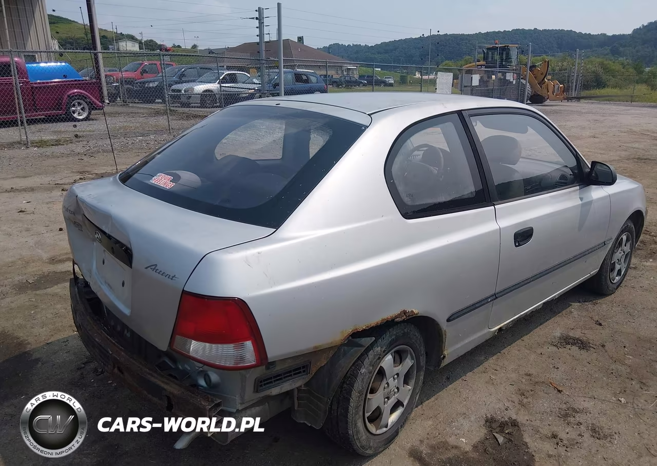 2002 Hyundai Accent L VIN:KMHCF35GX2U164933 - 4