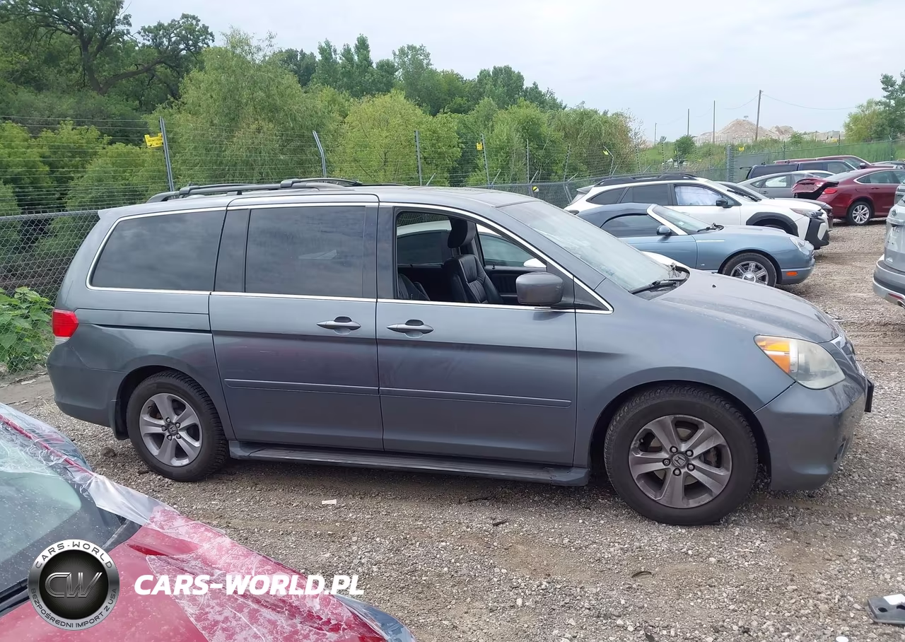 2010 Honda Odyssey Touring VIN:5FNRL3H91AB044773 - 13