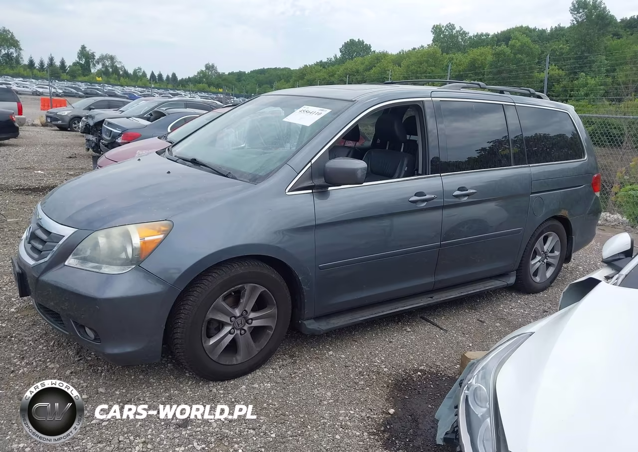2010 Honda Odyssey Touring VIN:5FNRL3H91AB044773 - 14