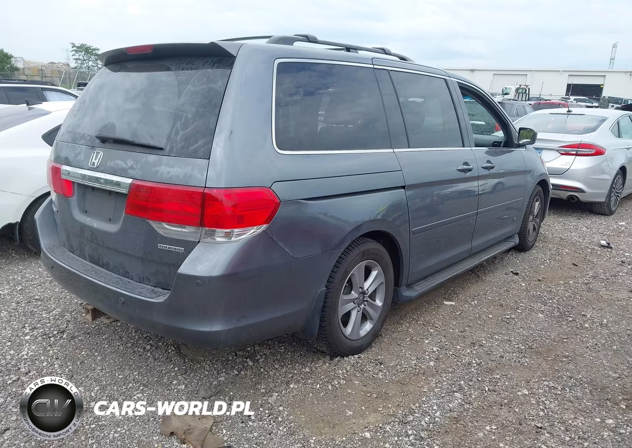 2010 Honda Odyssey Touring VIN:5FNRL3H91AB044773 - 4