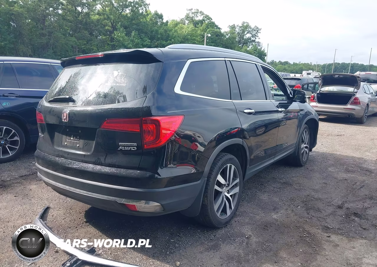 2016 Honda Pilot Touring VIN:5FNYF6H94GB097190 - 4