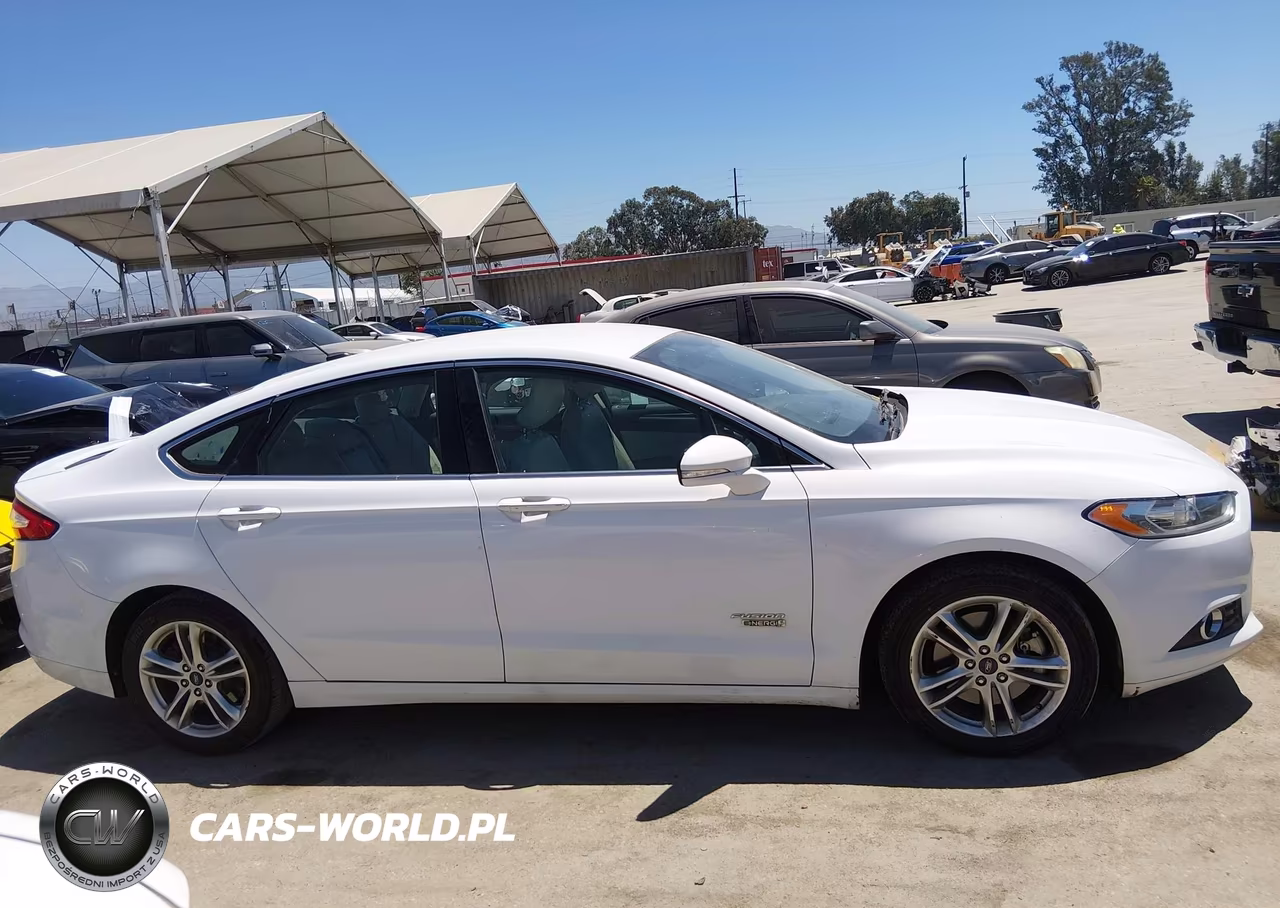 2016 Ford Fusion Energi Titanium VIN:3FA6P0SUXGR144712 - 13