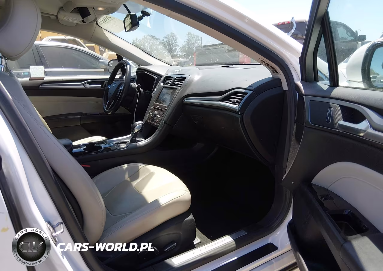 2016 Ford Fusion Energi Titanium VIN:3FA6P0SUXGR144712 - 5