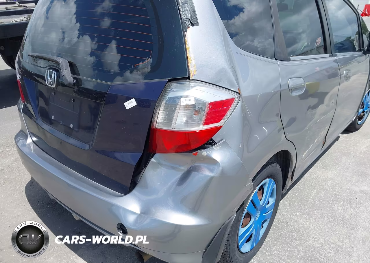 2009 Honda Fit VIN:JHMGE88269S022394 - 13