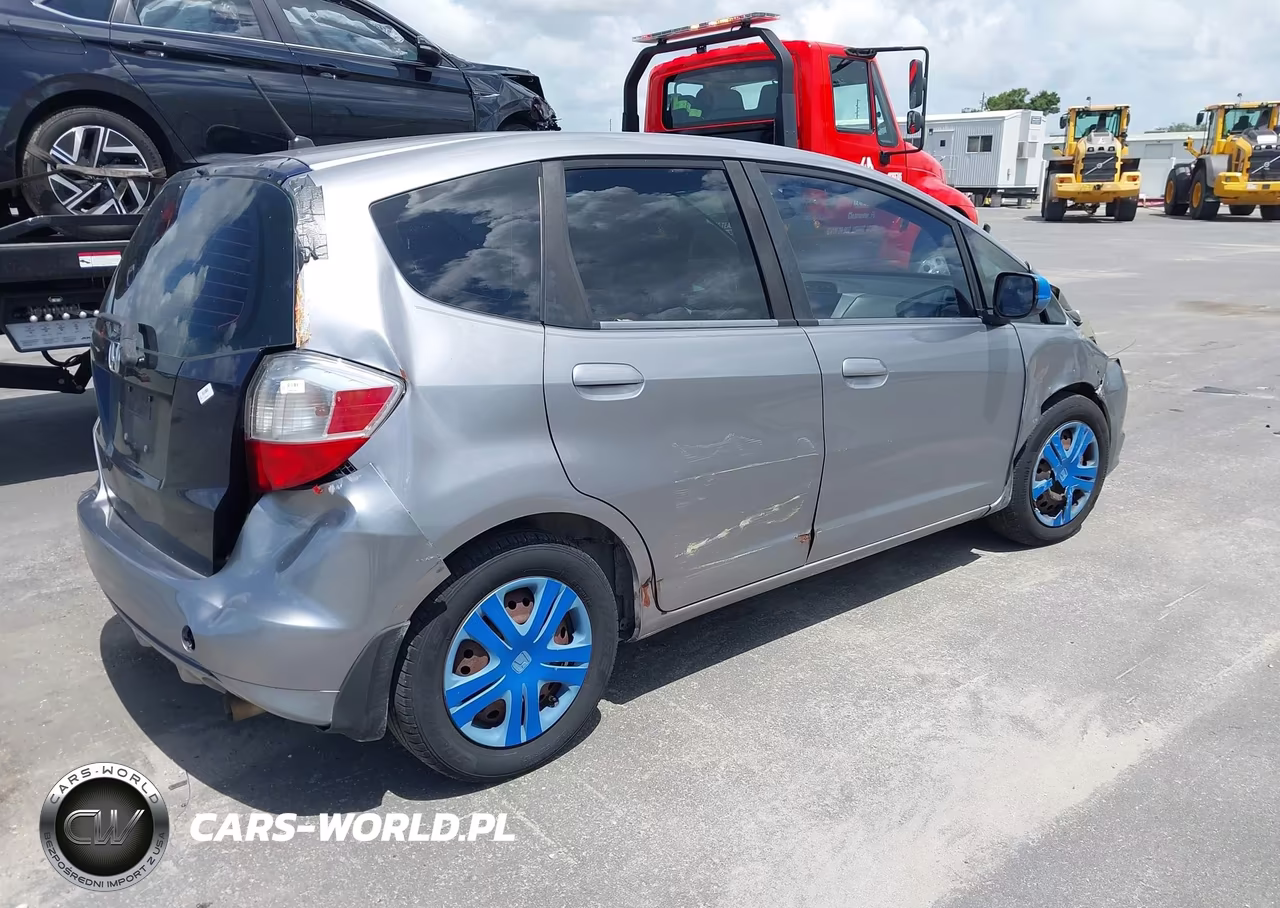 2009 Honda Fit VIN:JHMGE88269S022394 - 4