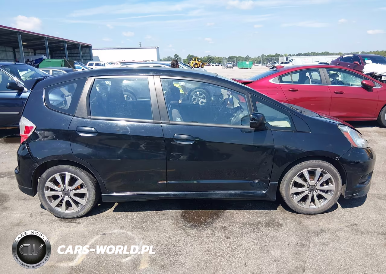 2012 Honda Fit Sport VIN:JHMGE8H65CC042205 - 13