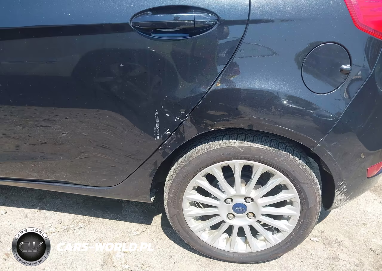 2015 Ford Fiesta Titanium VIN:3FADP4FJ1FM106134 - 12