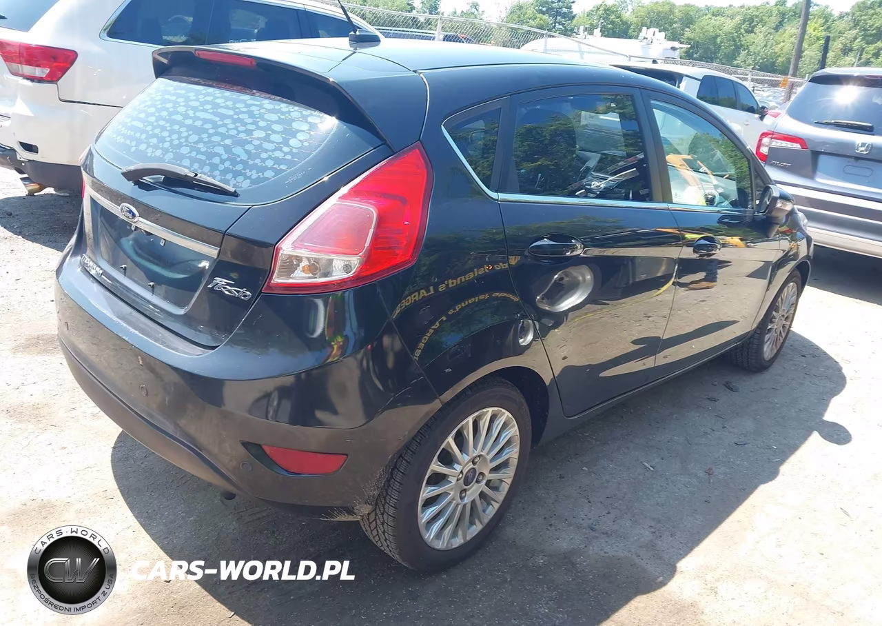 2015 Ford Fiesta Titanium VIN:3FADP4FJ1FM106134 - 4