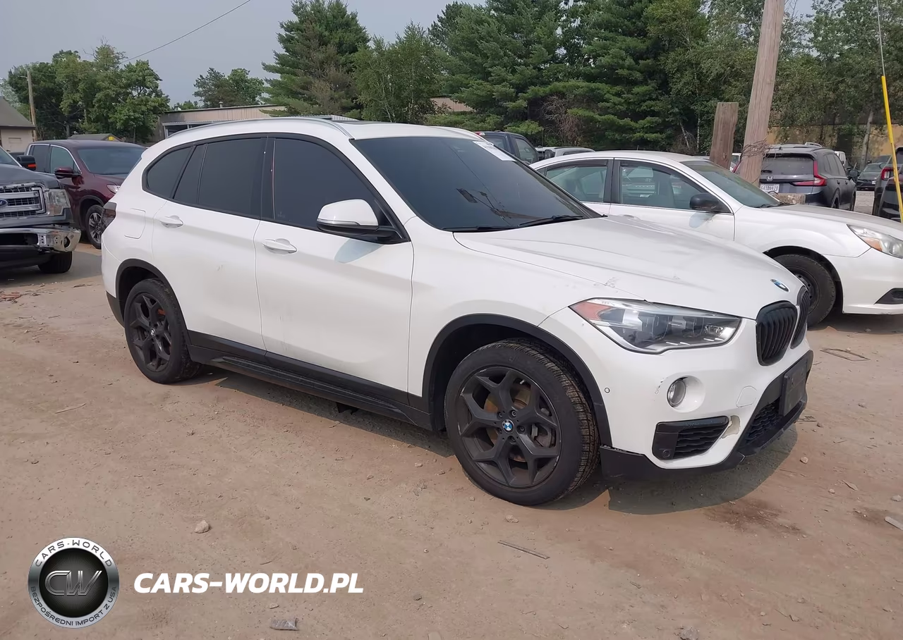 2018 BMW X1 xDrive28I VIN:WBXHT3C37J5L31571 - 1