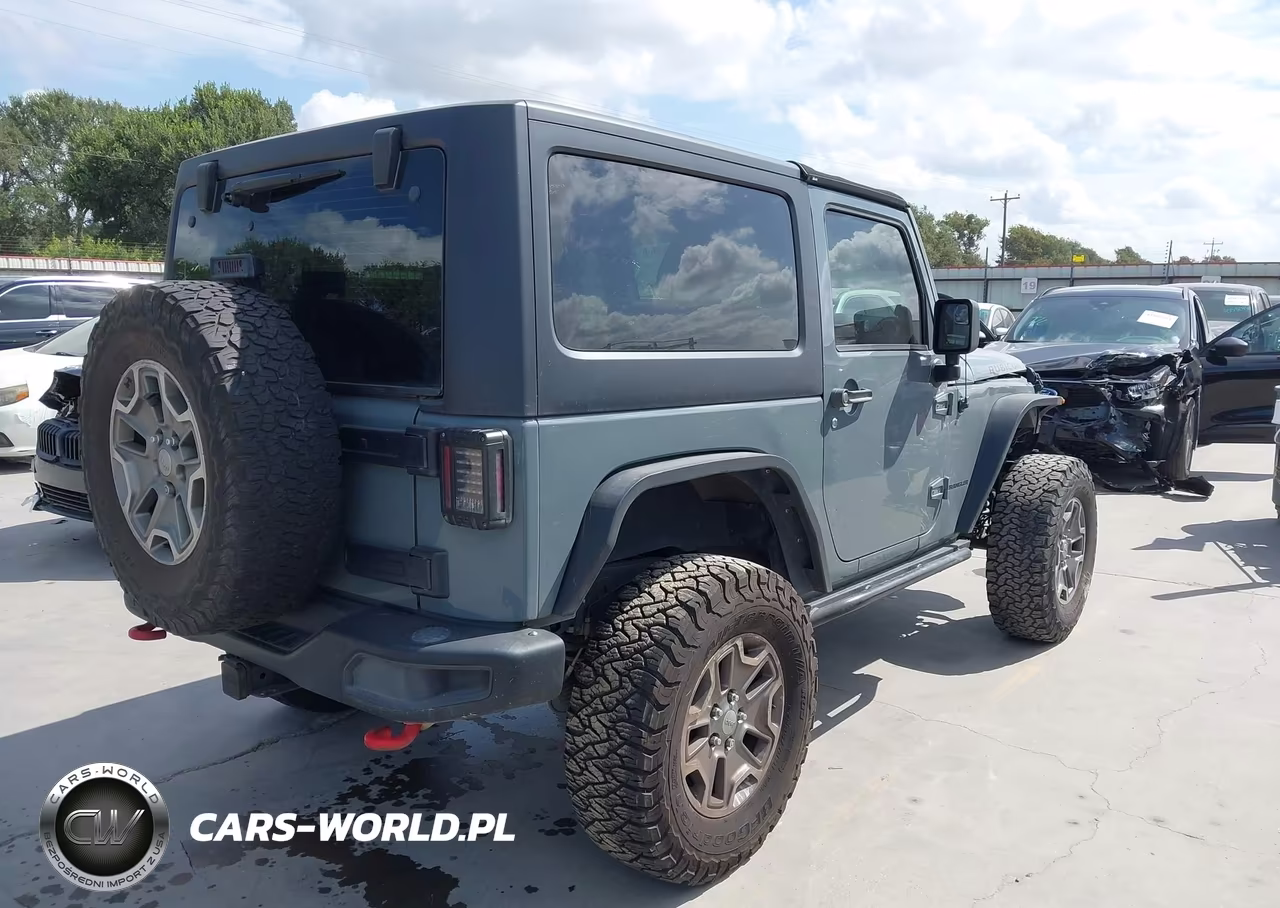 2014 Jeep Wrangler Rubicon VIN:1C4BJWCGXEL181177 - 4