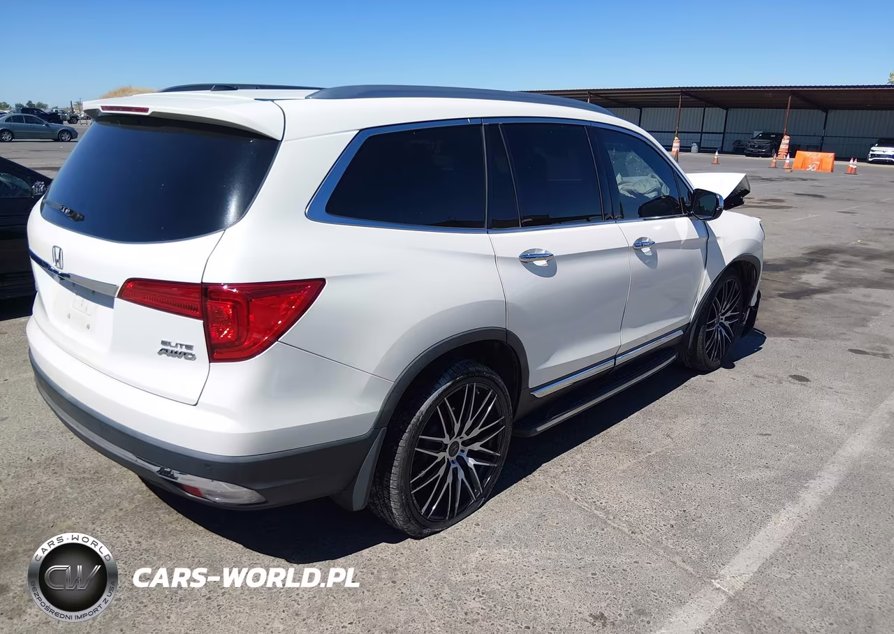 2016 Honda Pilot Elite VIN:5FNYF6H05GB069612 - 4