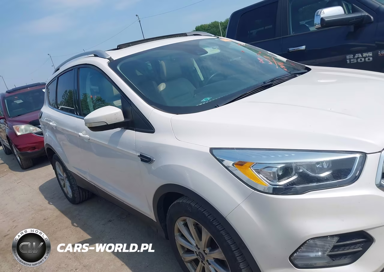 2017 Ford Escape Titanium VIN:1FMCU0J99HUE25781 - 13