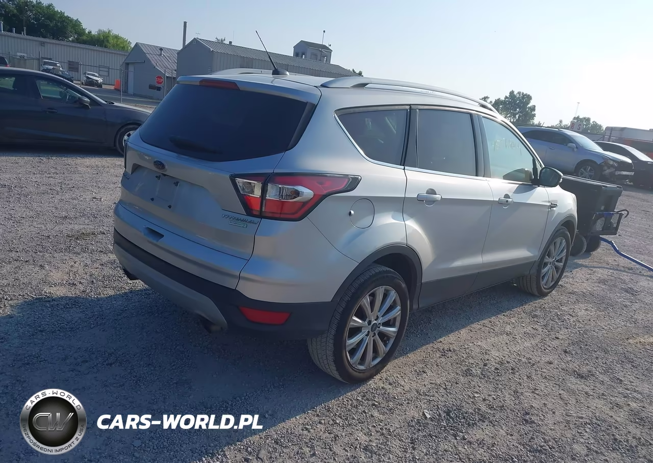 2017 Ford Escape Titanium VIN:1FMCU0JD9HUA33131 - 4