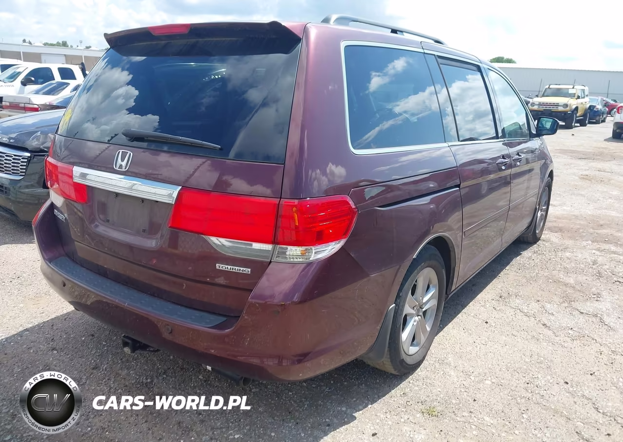 2010 Honda Odyssey Touring VIN:5FNRL3H92AB053224 - 4