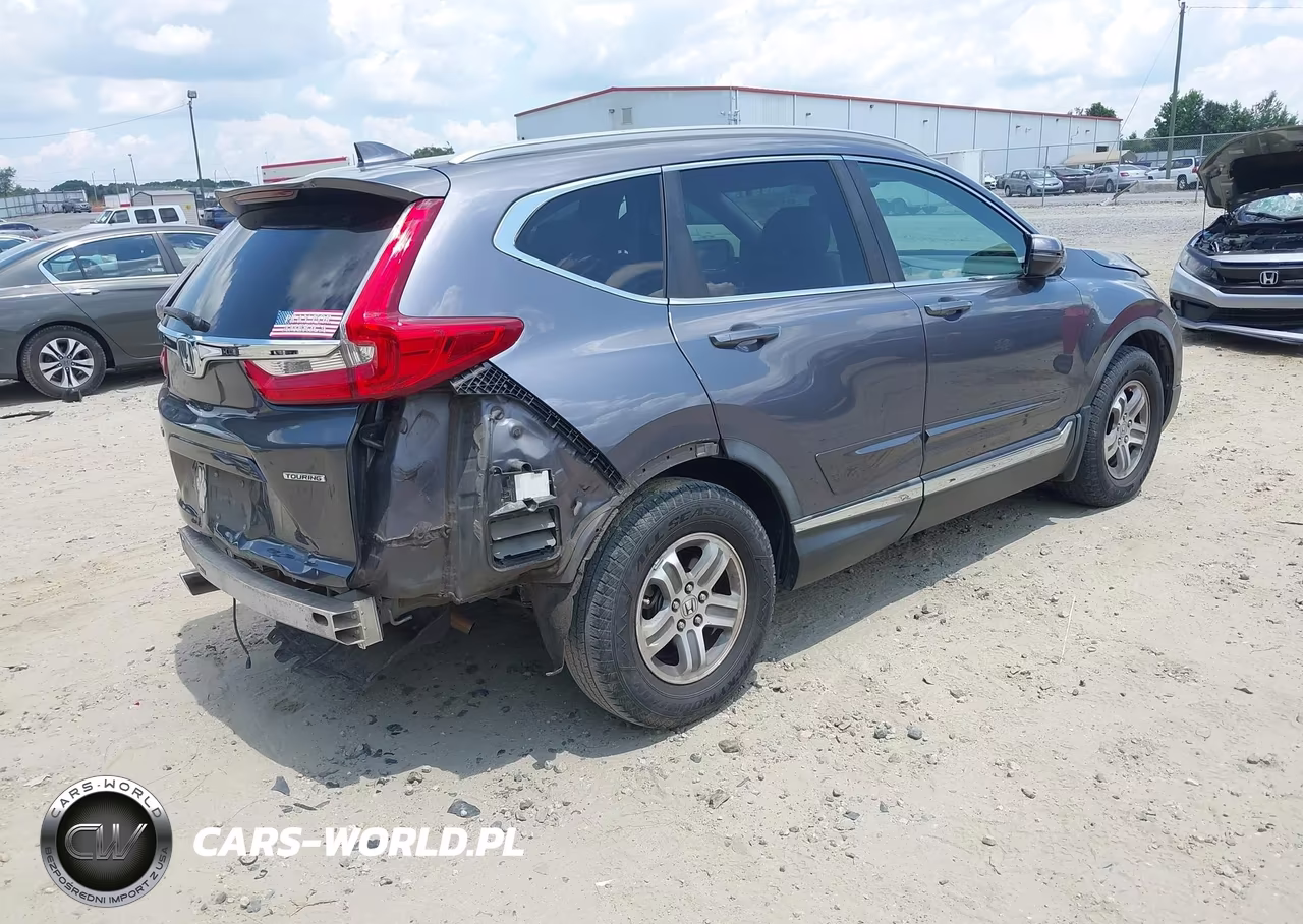 2017 Honda Cr-V Touring VIN:5J6RW1H98HL006552 - 4