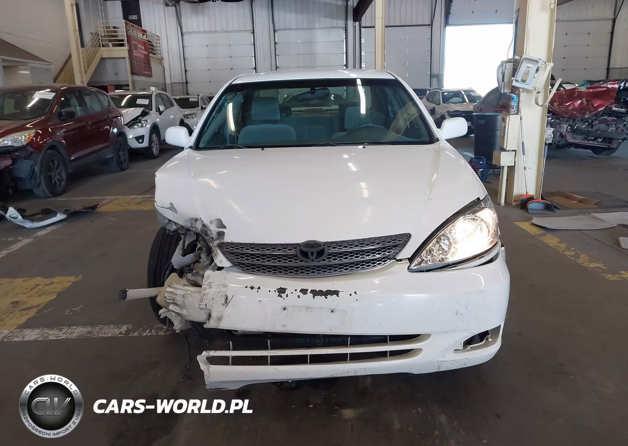 2002 Toyota Camry Le VIN:JTDBE32K920089533 - 13