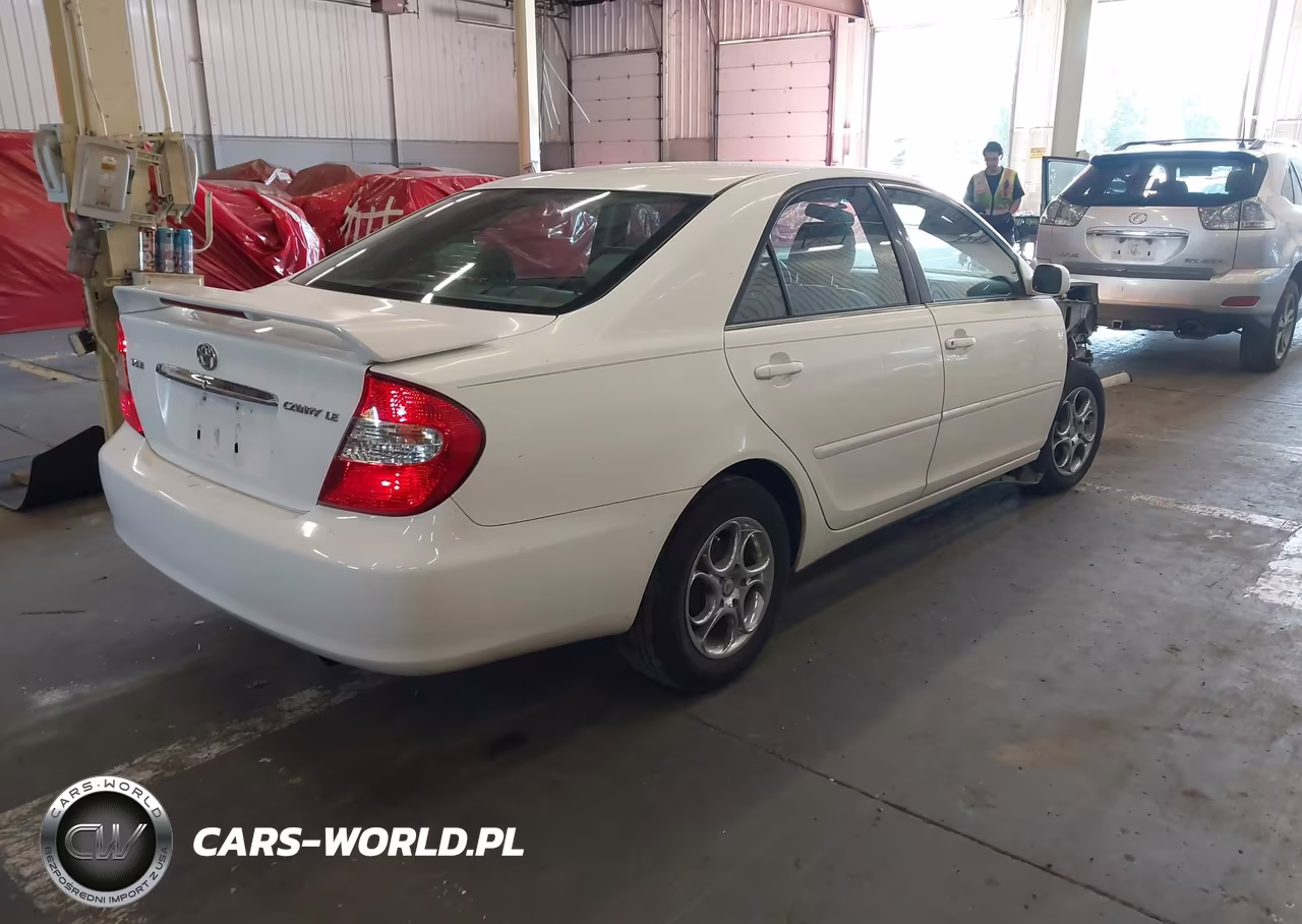 2002 Toyota Camry Le VIN:JTDBE32K920089533 - 4