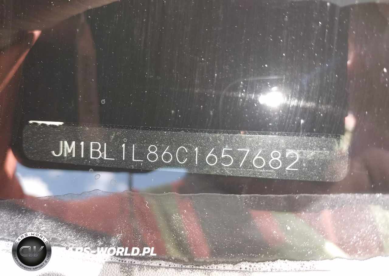 2012 Mazda Mazda3 I Touring VIN:JM1BL1L86C1657682 - 9