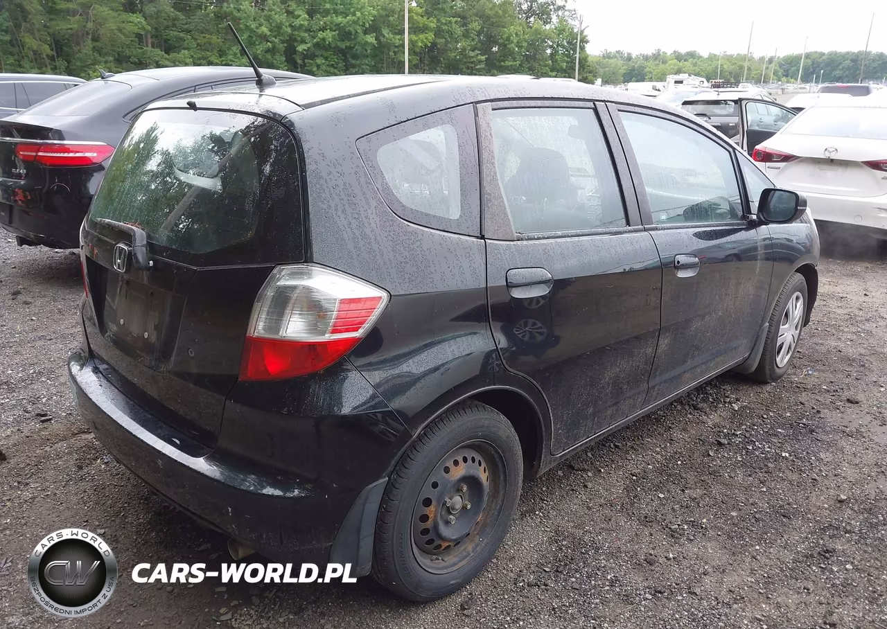 2009 Honda Fit VIN:JHMGE88259S028302 - 4