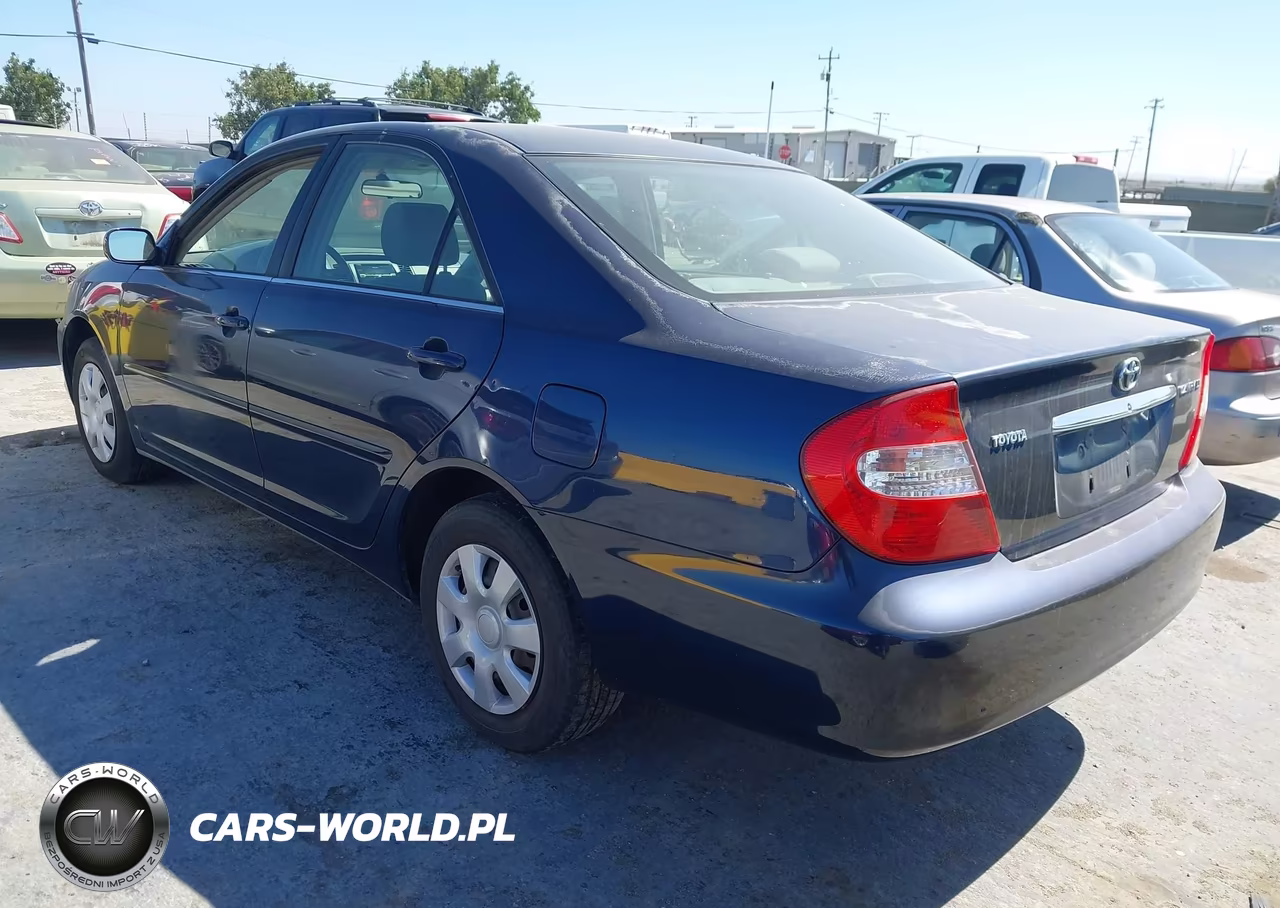2002 Toyota Camry Le VIN:JTDBE32K120124954 - 3