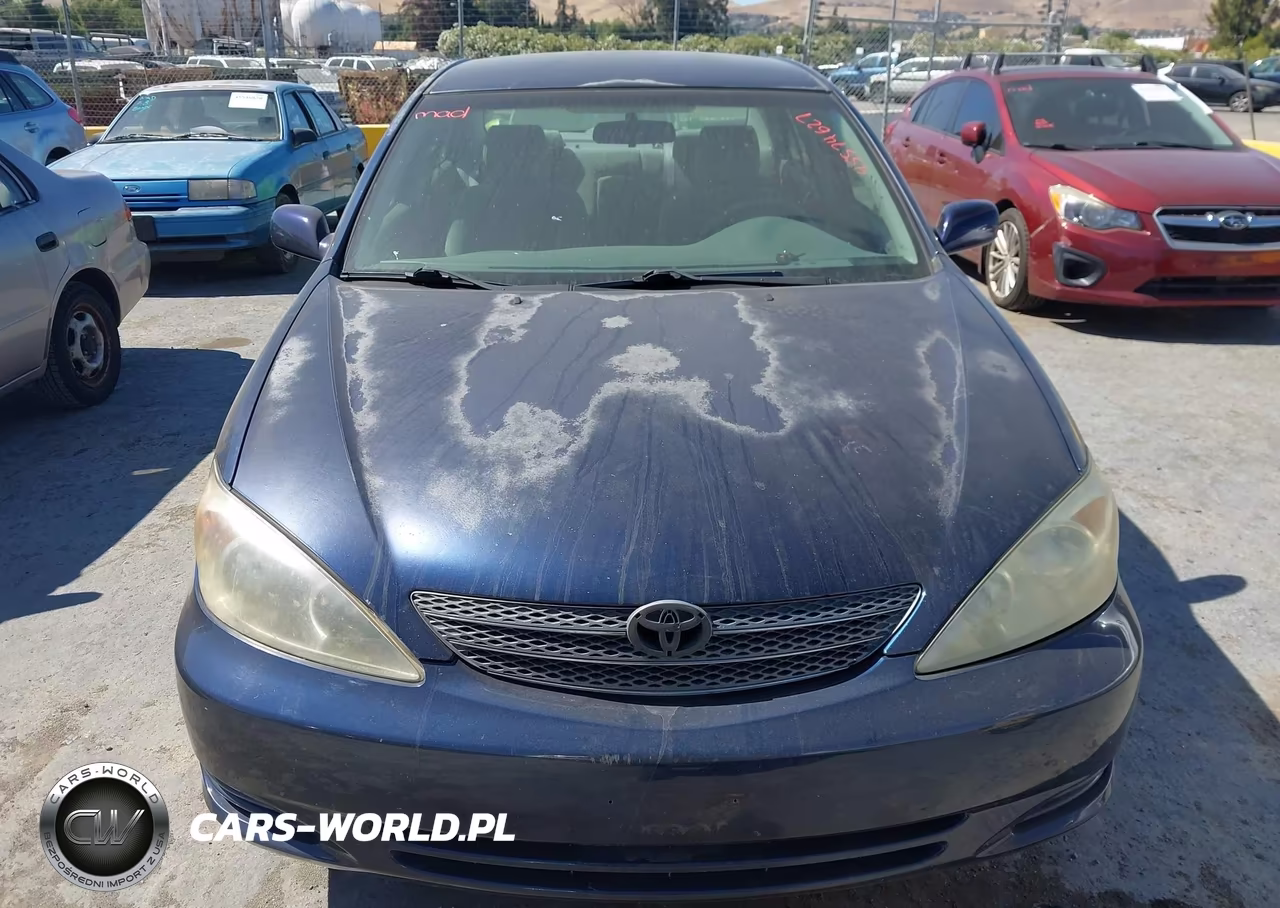 2002 Toyota Camry Le VIN:JTDBE32K120124954 - 6
