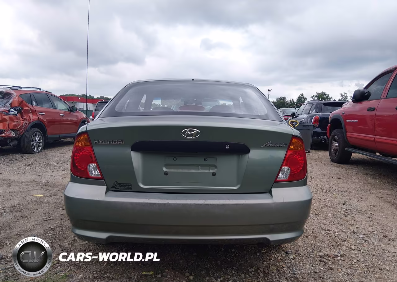 2004 Hyundai Accent VIN:KMHCF35C54U299866 - 13