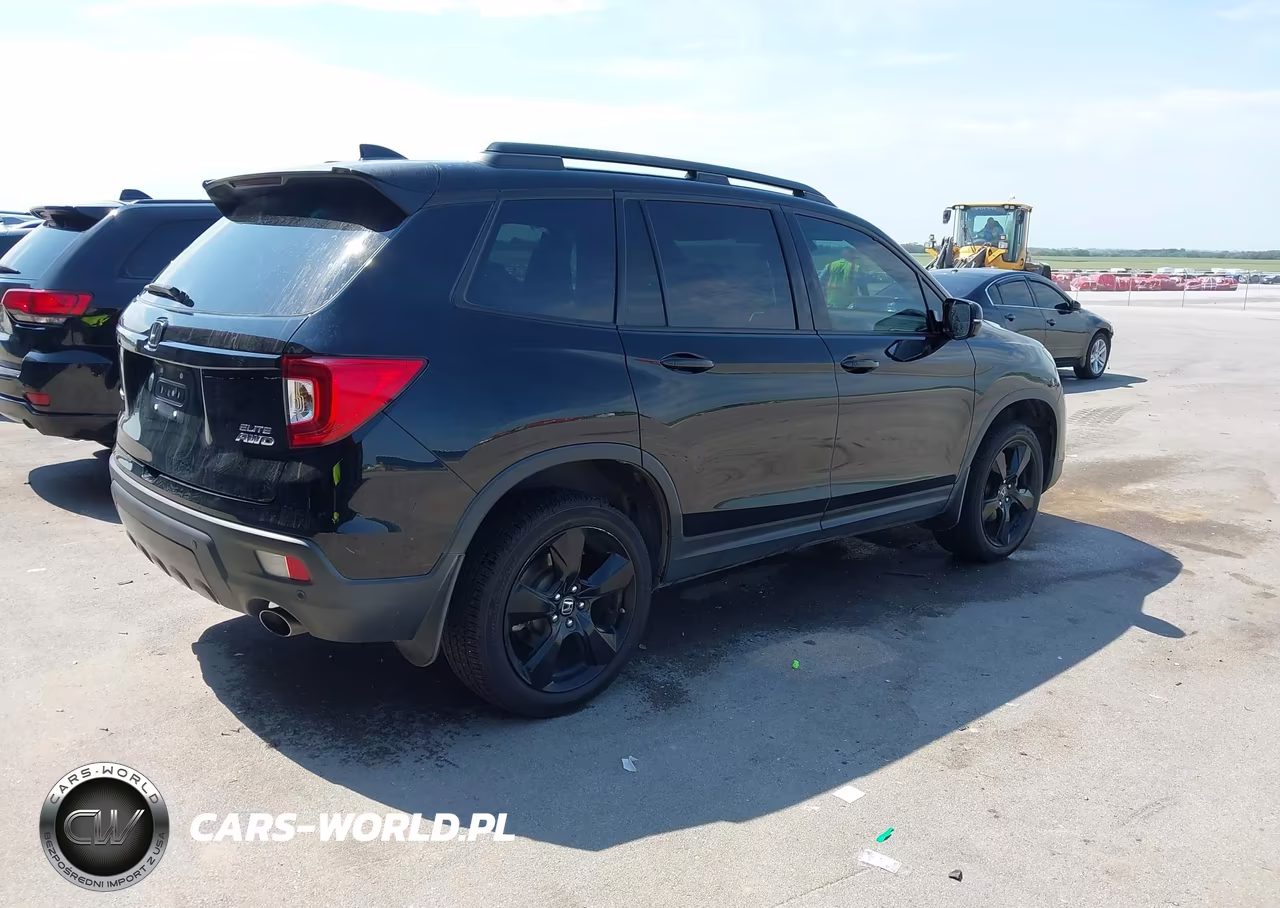 2019 Honda Passport Elite VIN:5FNYF8H0XKB005764 - 4
