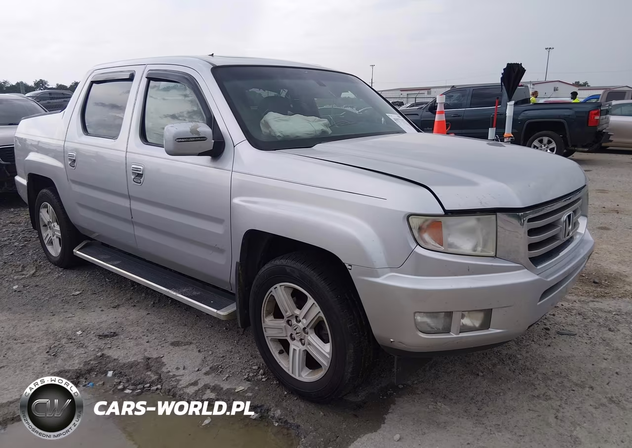 2012 Honda Ridgeline Rtl VIN:5FPYK1F51CB452185 - 1