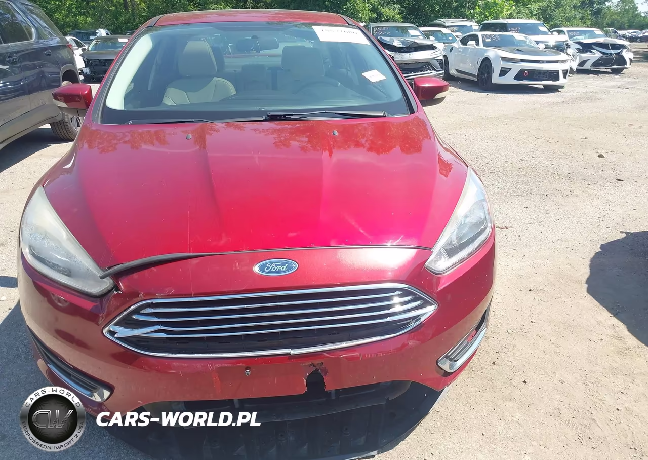 2017 Ford Focus Titanium VIN:1FADP3J24HL272355 - 12