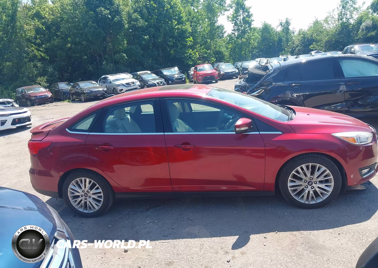 2017 Ford Focus Titanium VIN:1FADP3J24HL272355 - 13