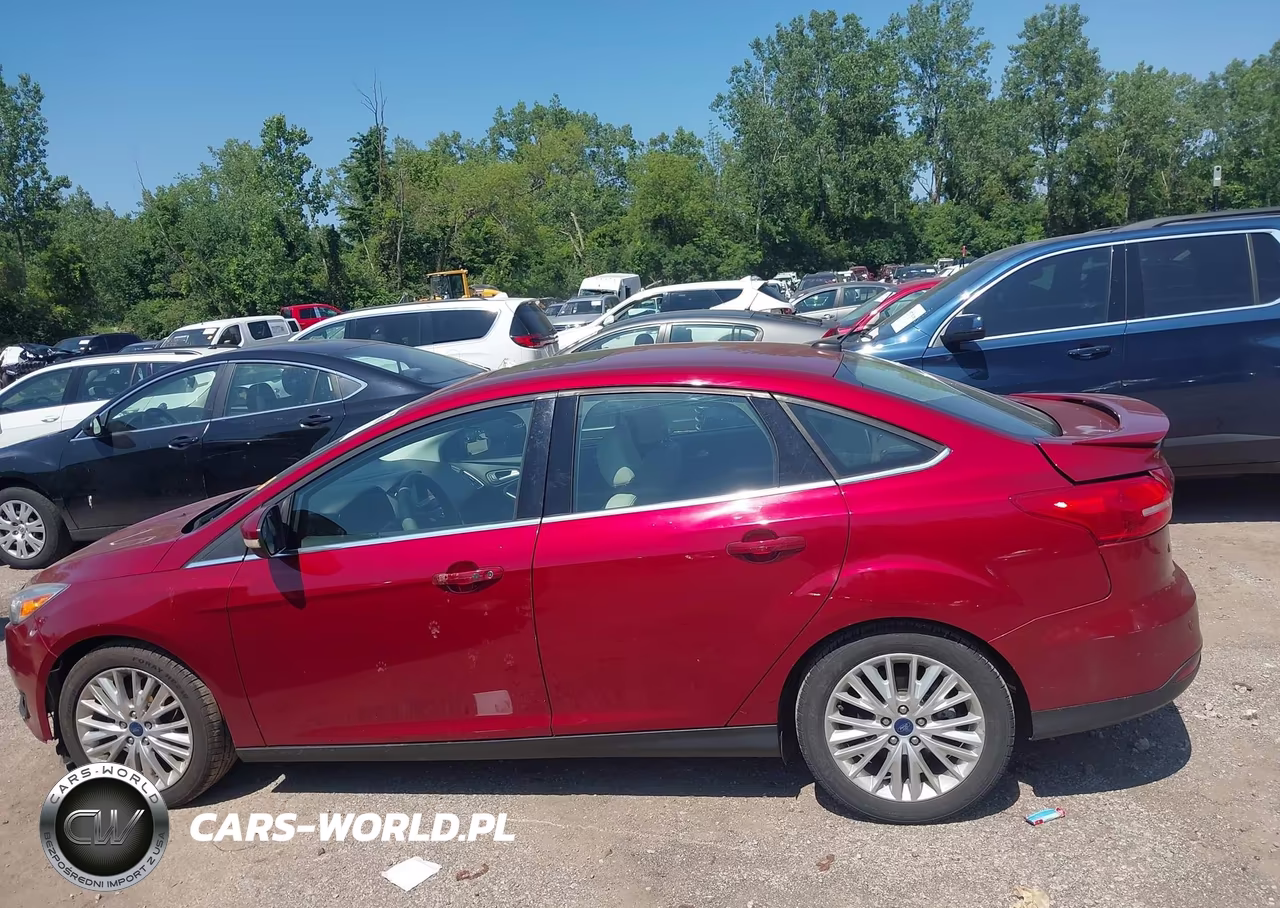 2017 Ford Focus Titanium VIN:1FADP3J24HL272355 - 14