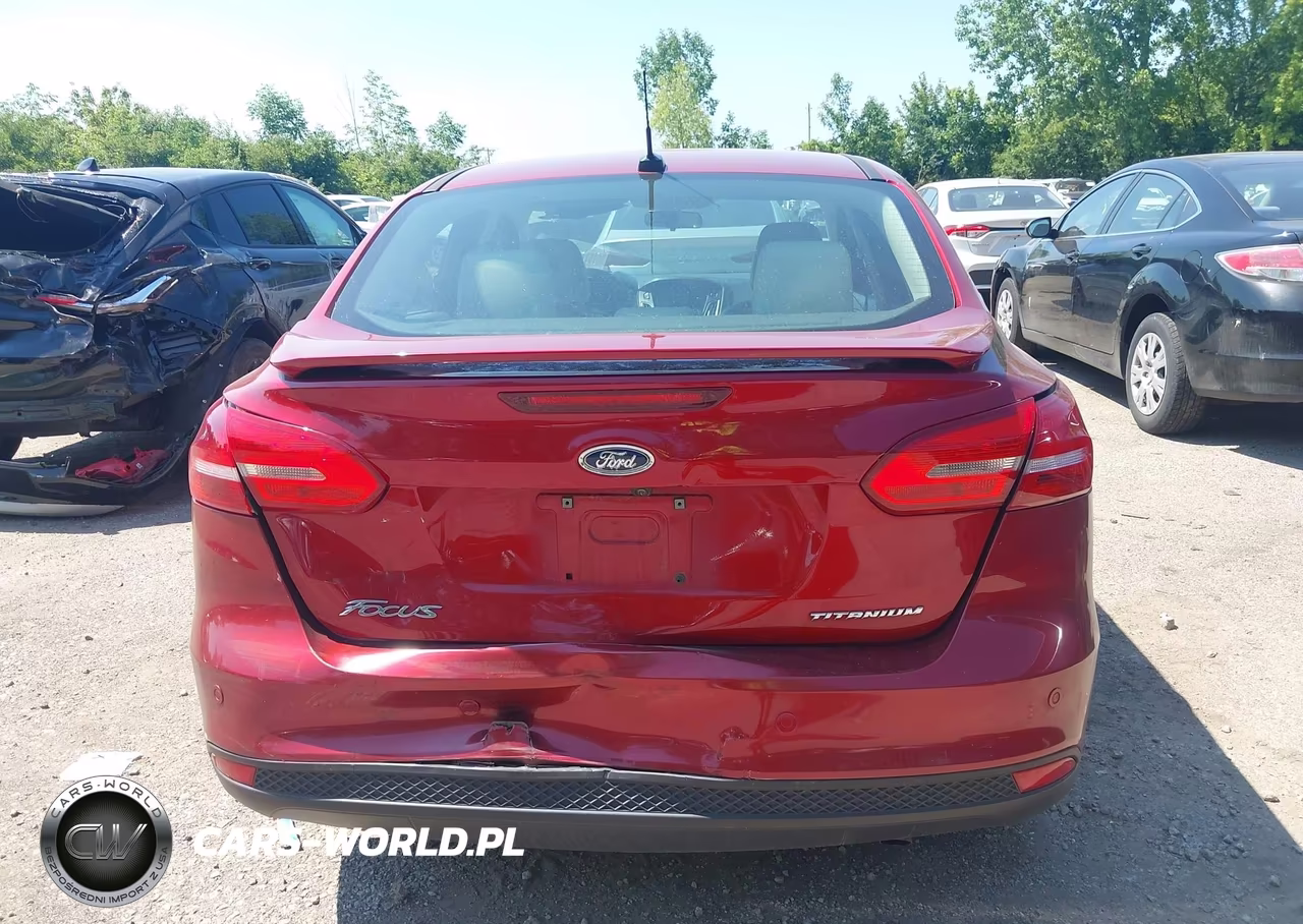 2017 Ford Focus Titanium VIN:1FADP3J24HL272355 - 16