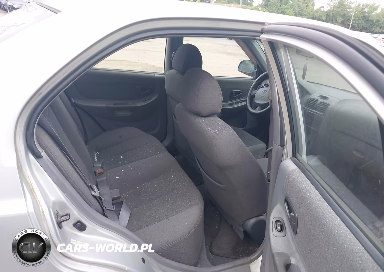 2002 Hyundai Accent Gl VIN:KMHCG45C62U401403 - 8