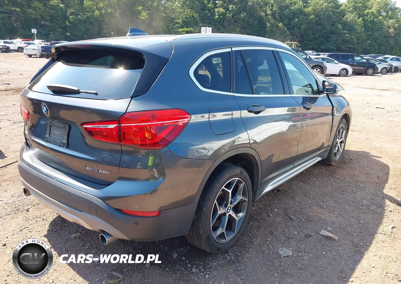2018 BMW X1 Sdrive28I VIN:WBXHU7C38J5L06571 - 4