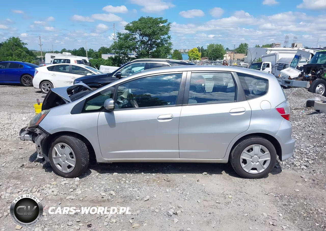 2012 Honda Fit VIN:JHMGE8H38CS000137 - 13