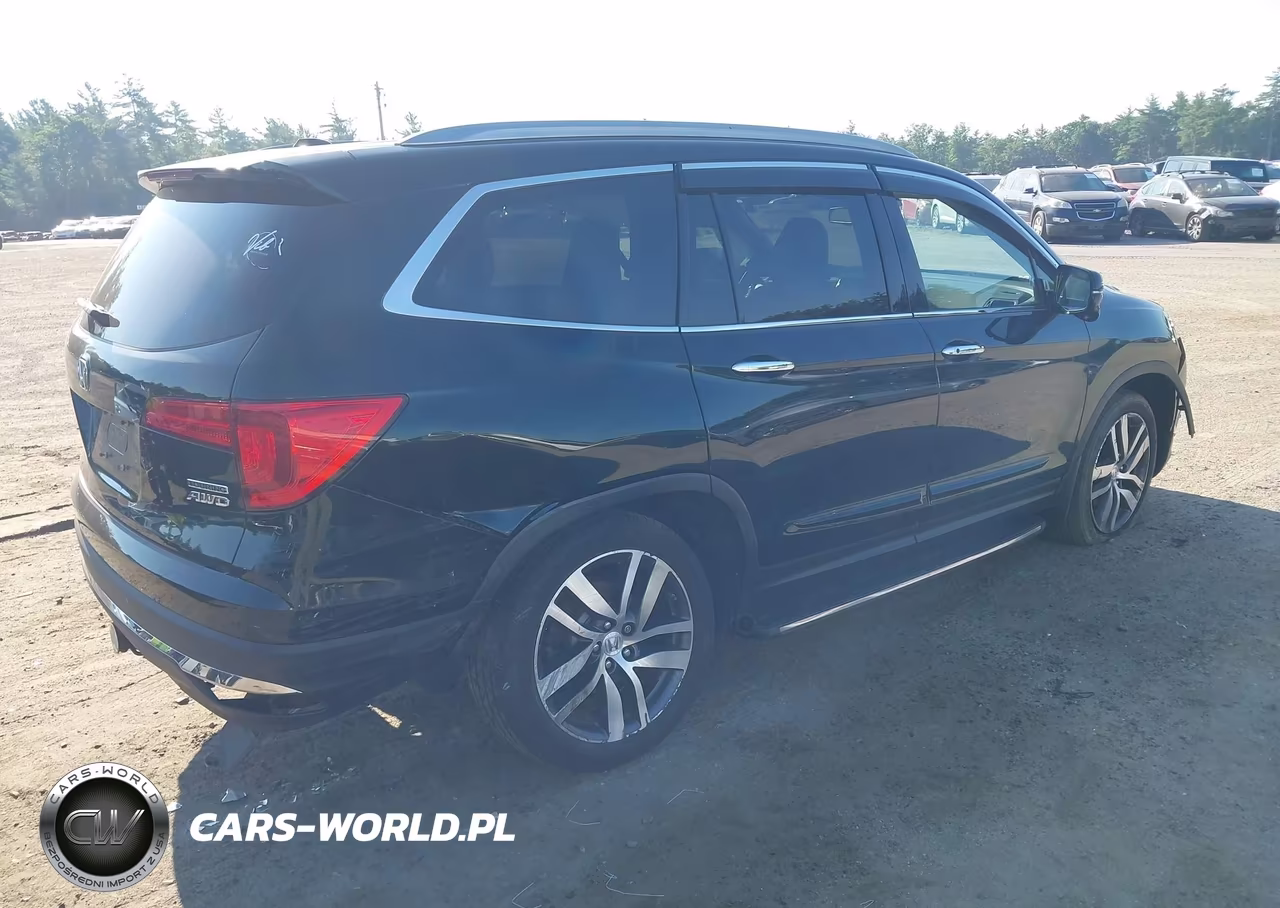2017 Honda Pilot Touring VIN:5FNYF6H99HB035785 - 4
