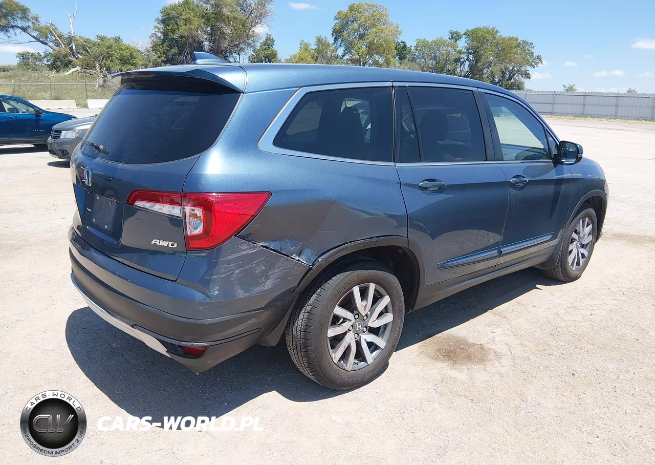 2022 Honda Pilot Awd Ex-L VIN:5FNYF6H55NB007636 - 4