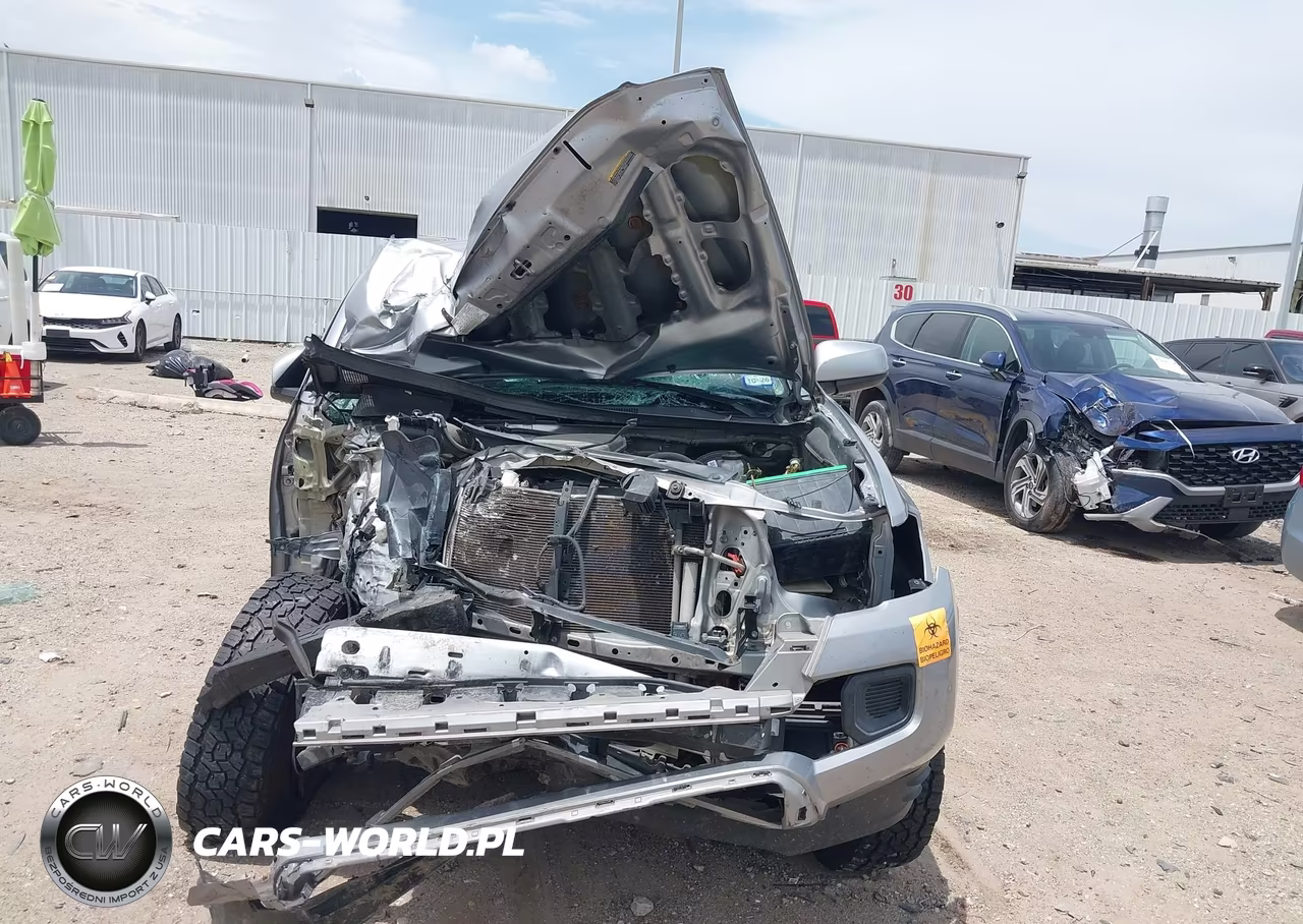 2018 Toyota Tacoma Sr VIN:5TFAX5GN4JX114378 - 12