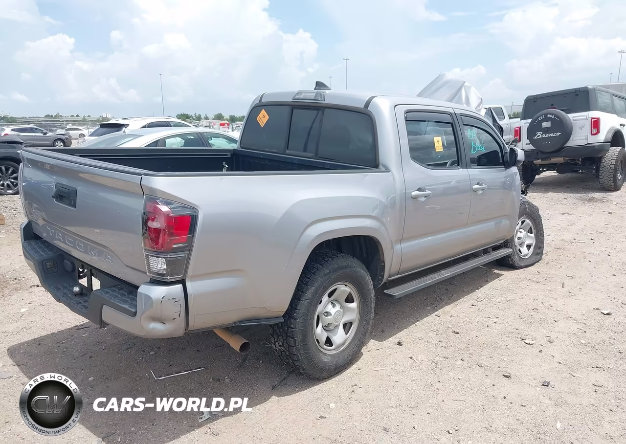 2018 Toyota Tacoma Sr VIN:5TFAX5GN4JX114378 - 4