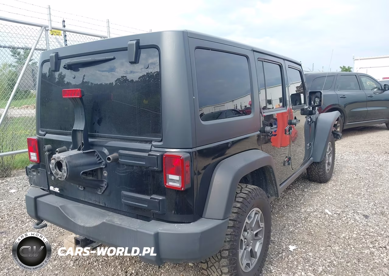 2014 Jeep Wrangler Unlimited Rubicon VIN:1C4BJWFG3EL266714 - 4