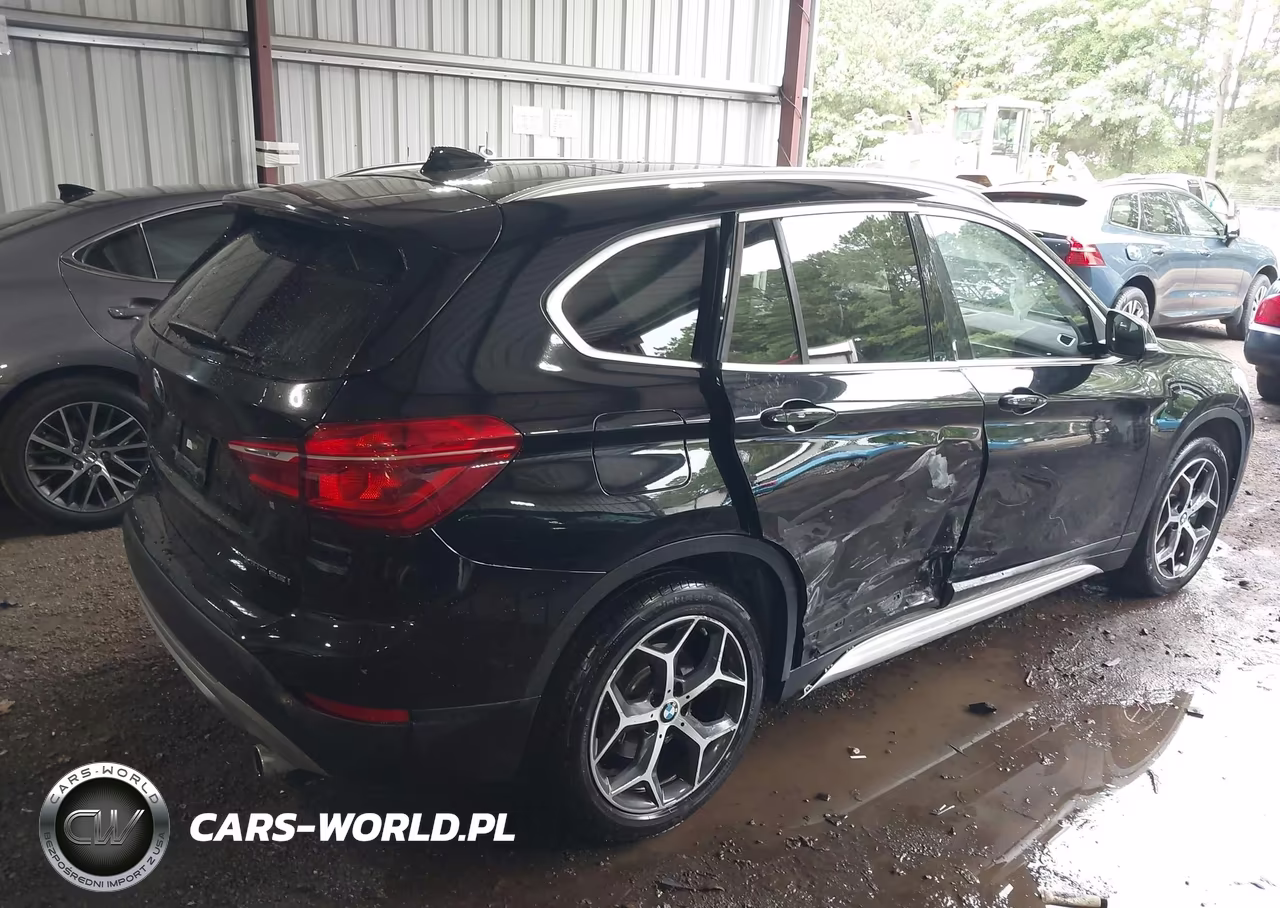 2018 BMW X1 xDrive28I VIN:WBXHT3C35J5L31116 - 4