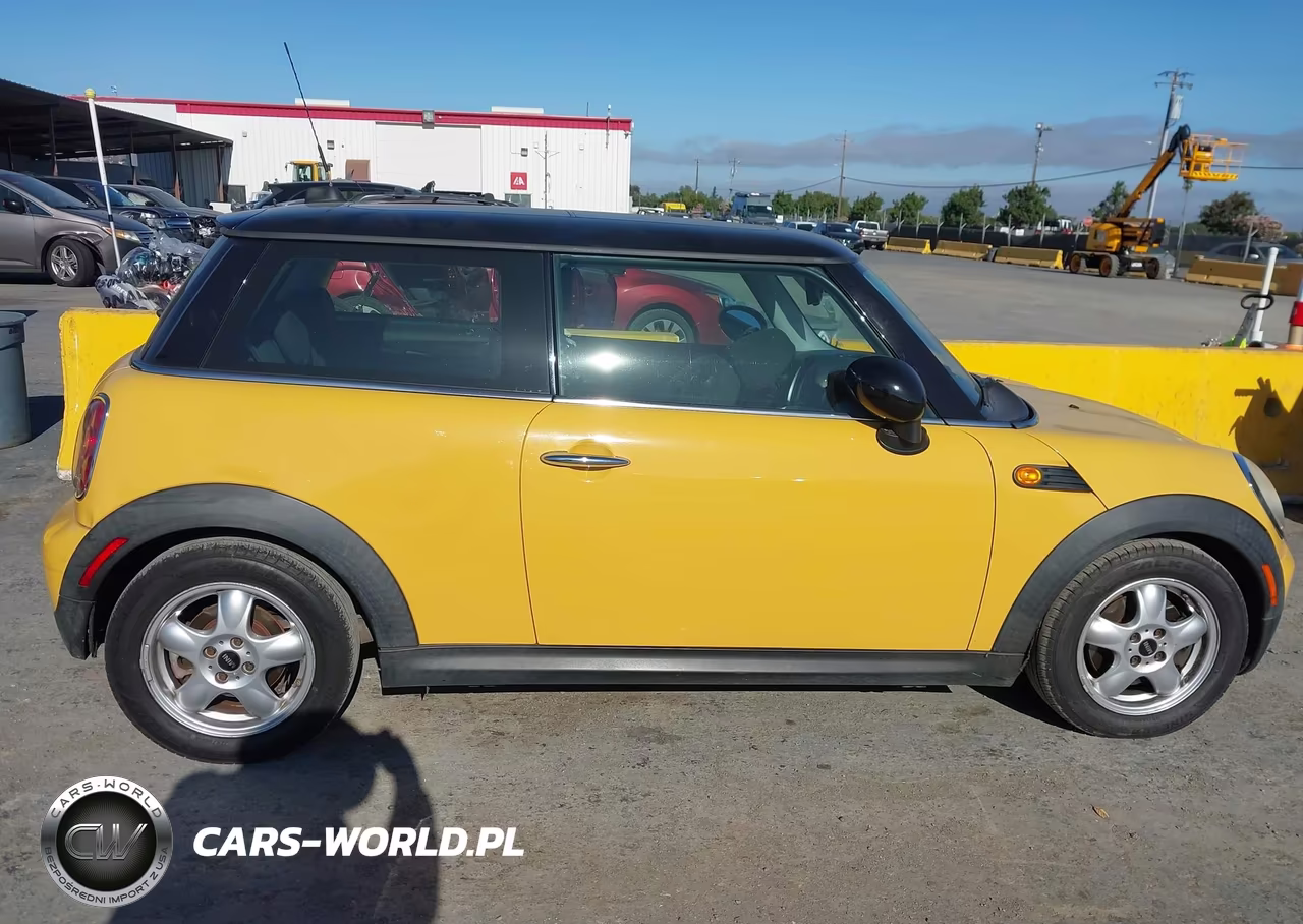 2009 Mini Cooper VIN:WMWMF33539TU72677 - 13