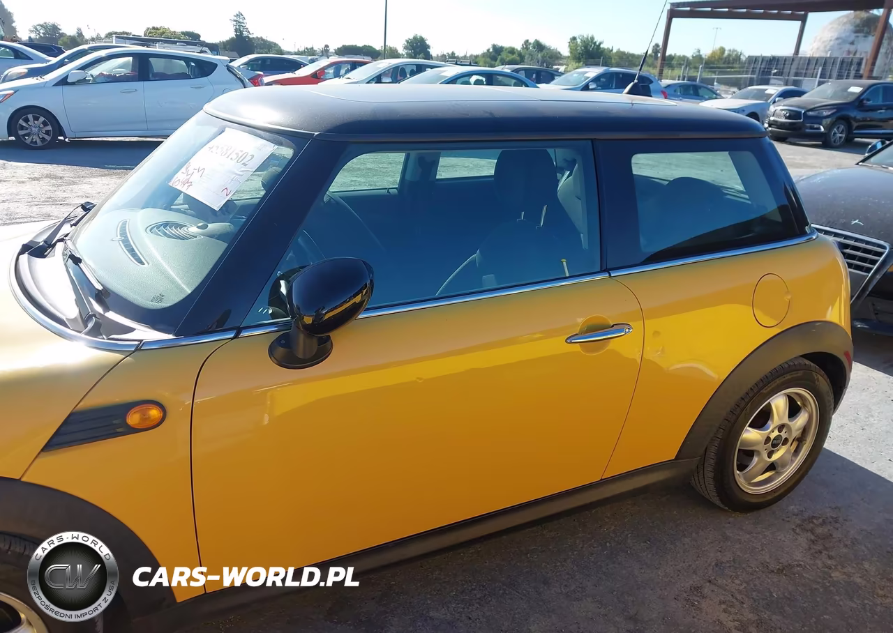 2009 Mini Cooper VIN:WMWMF33539TU72677 - 14