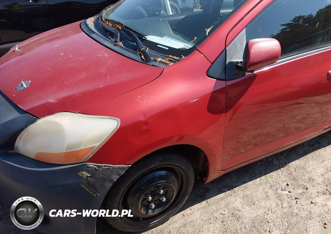 2009 Toyota Yaris VIN:JTDBT903X94061375 - 12