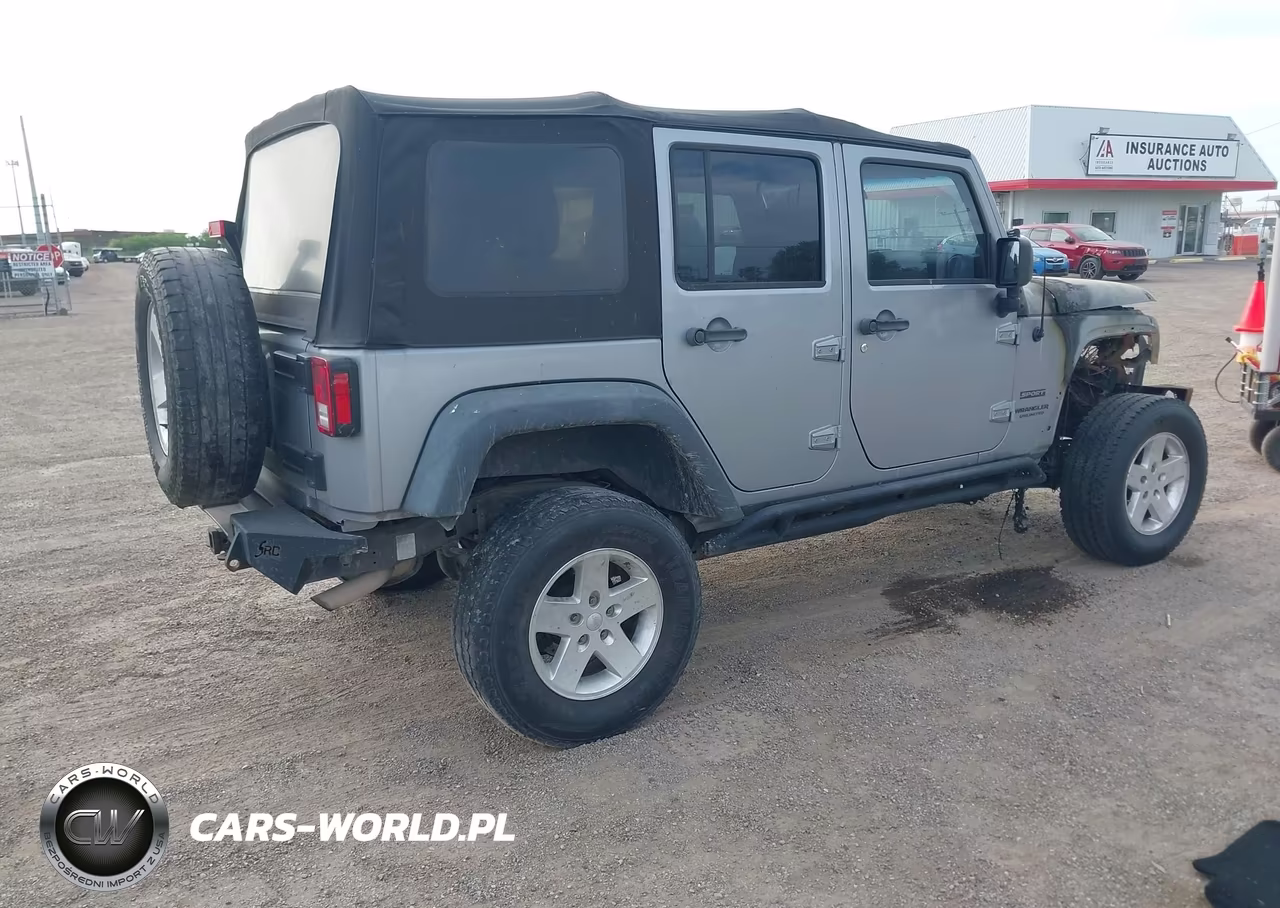 2014 Jeep Wrangler Unlimited Sport VIN:1C4HJWDGXEL133333 - 4